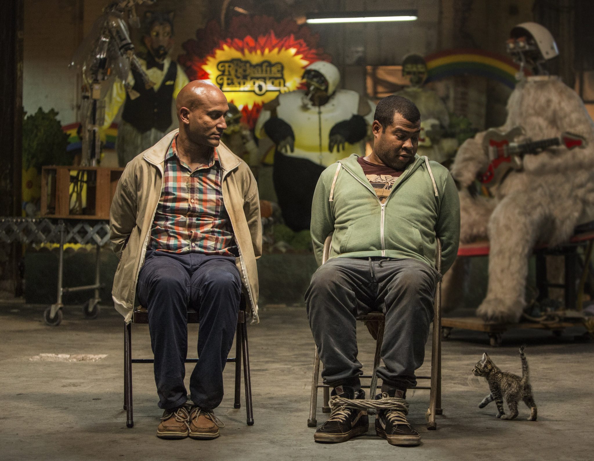 Scene from Keanu of Key and Peele tied up to chairs