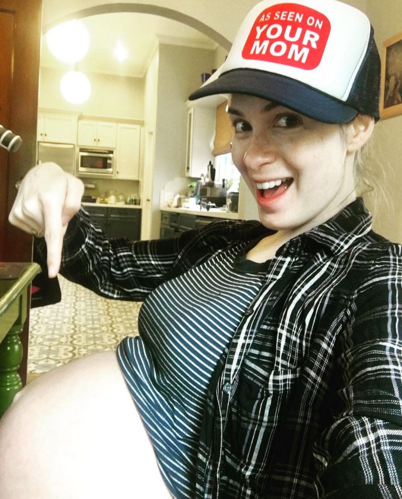 Felicia Day pointing to baby bump
