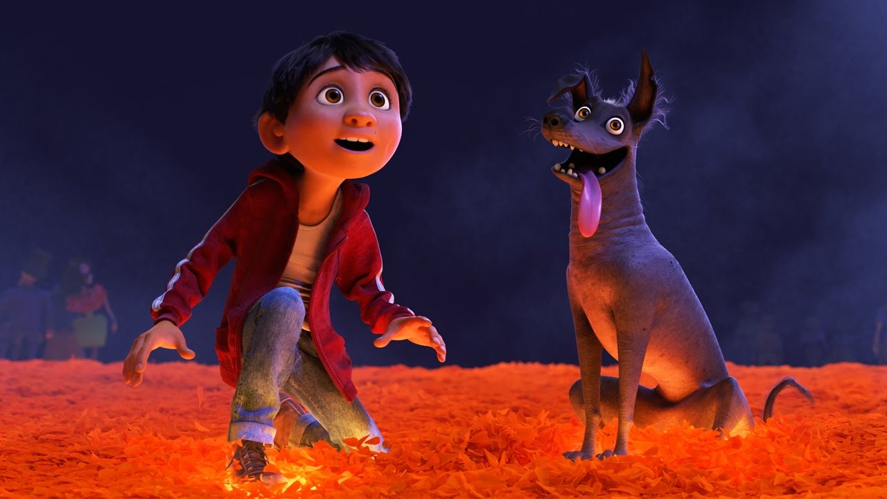 coco review - Miguel and dog from Pixar movie