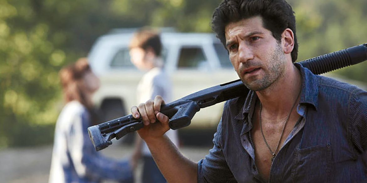 Shane in season 1 of The Walking Dead holding shotgun